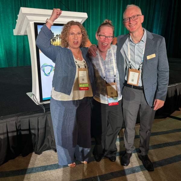 The LibLynx team celebrating on stage after winning the SSP Previews People’s Choice Award